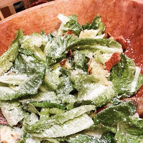 Caesar salad in a wooden bowl